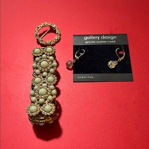 Set of three jewelry pieces: bracelet, earrings, and brooch